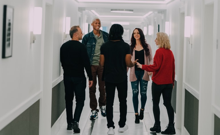 Group in hallway at Evolve Recovery Center